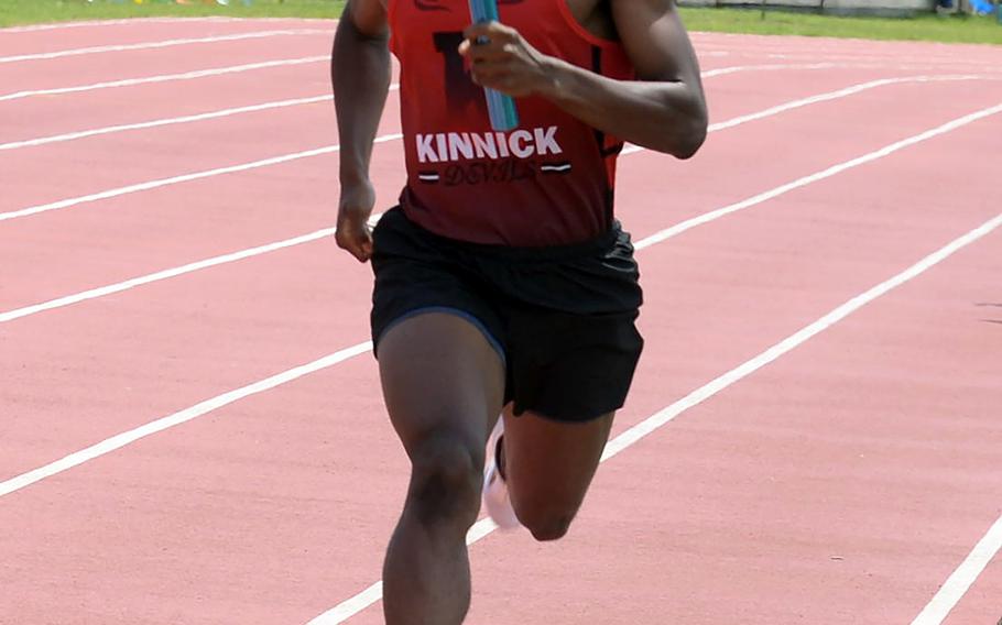 Carlos Mobley and Nile C. Kinnick held a slim 1 1/2-point lead over Humphreys for the overall Division I school lead after one day of competition in the Far East track and field meet.