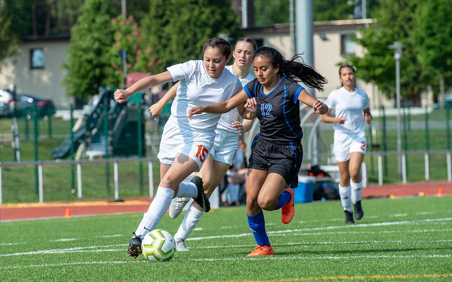 Spangdahlem's Chesney Tieyah and Hohenfels' Yadira Martinez battle for control of the ball during the girls Division III DODEA-Europe soccer championship game, Thursday, May 23, 2019. Spangdahlem won the game 4-2. 