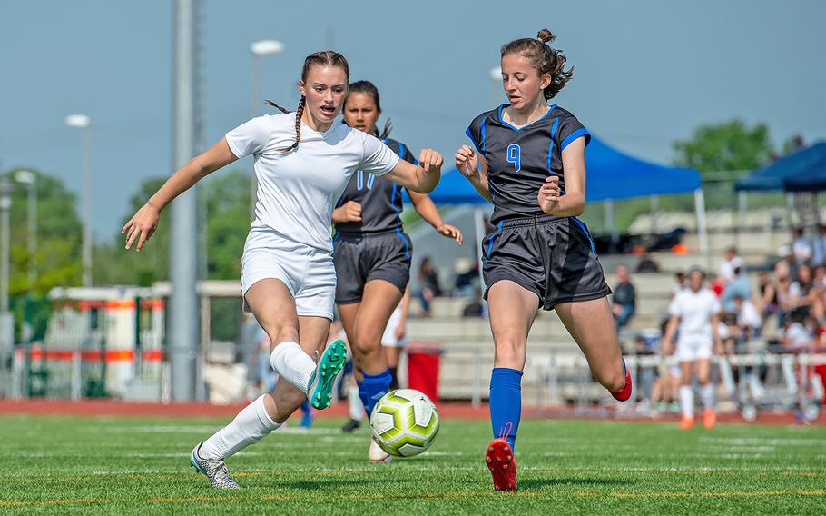 Spangdahlem's Chloe Smith and Hohenfels' Marycate Jackson battle for control of the ball during the girls Division III DODEA-Europe soccer championship game, Thursday, May 23, 2019. Spangdahlem won the game 4-2. 
