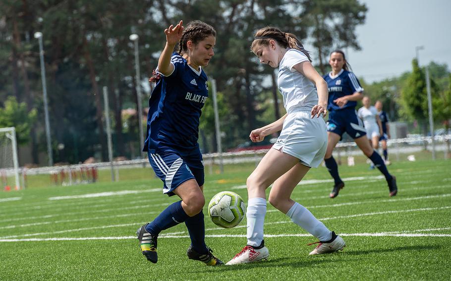 BFA's Debbie Widmer and Marymount's Grace Hitchman battle for the ball during the girls Division II DODEA-Europe soccer championship game, Thursday, May 23, 2019. BFA won the game 5-0. 
