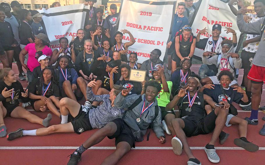 Humphreys shows off its banners following its sweep of the Far East Division I track and field meet titles.