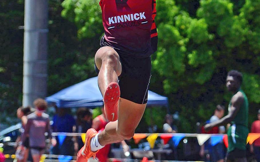 Kinnick's Chris Watson takes off for a Far East track and field meet winning long jump of 6.50 meters.