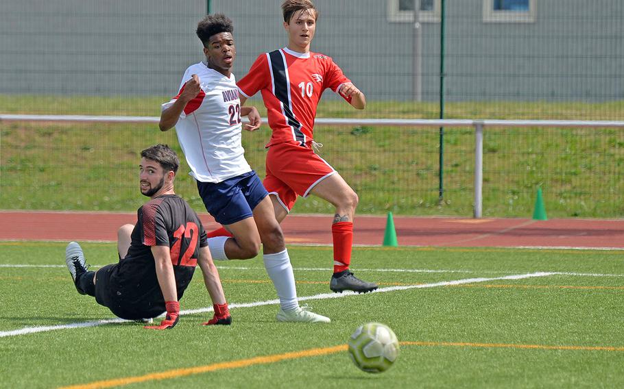 Aviano's Giacomo Fabbro and Josiah Cooper watch Alessandro Ianni's ball head to the net for AOSR's second goal in their 4-0 victory over Aviano in the boys Division II final at the DODEA-Europe championships in Kaiserslautern on Thursday, May 23, 2019. 