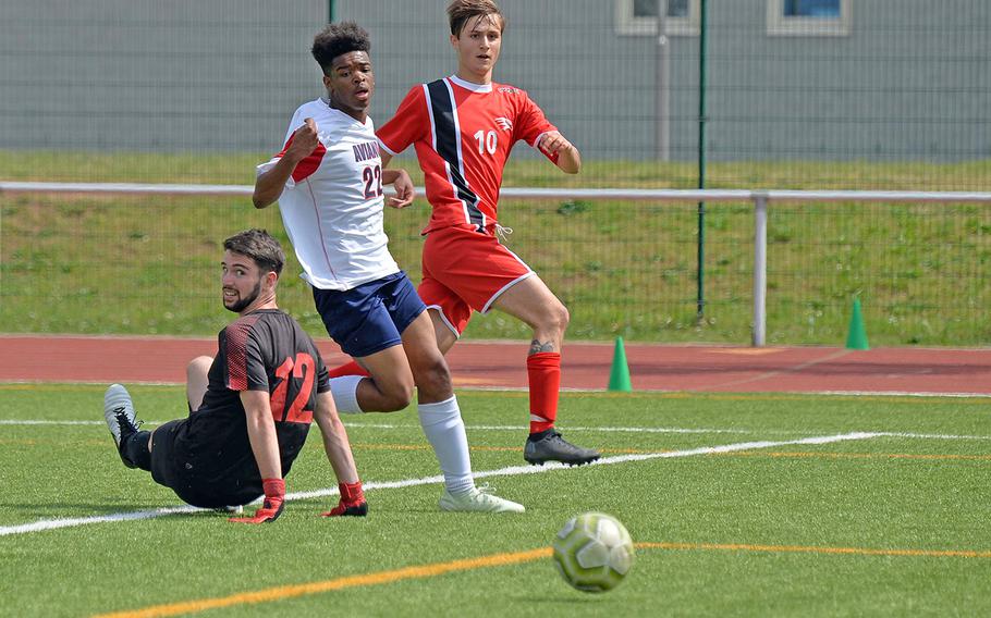 Aviano's Giacomo Fabbro and Josiah Cooper watch Alessandro Ianni's ball head to the net for AOSR's second goal in their 4-0 victory over Aviano in the boys Division II final at the DODEA-Europe championships in Kaiserslautern on Thursday, May 23, 2019.