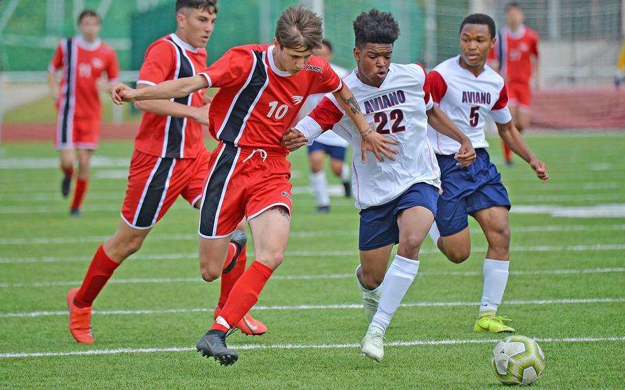 Aviano's Josiah Cooper tries to stop AOSR's Alessandro Ianni in the boys Division II final at the DODEA-Europe championships in Kaiserslautern on Thursday, May 23, 2019. AOSR won the all-Italy final 4-0.
