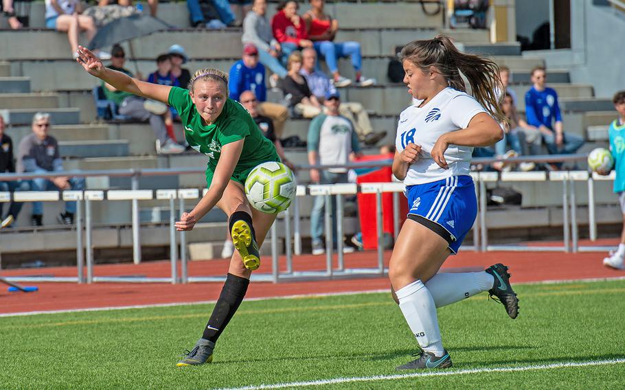Naples' Victoria Sasse takes a shot on goal during the girls Division I DODEA-Europe soccer championship game against Wiesbaden, Thursday, May 23, 2019. Wiesbaden won the game 2-0.