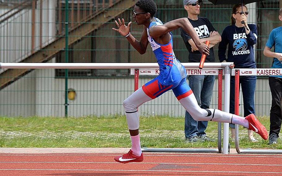 Ramstein's Jeremiah Allen runs the 400-meter leg of the 1,600-meter sprint medley at the DODEA-Europe track and field finals in Kaiserslautern, Saturday, May 25, 2019. Allen and teammates Isaiah Allen, Jaelaun Bell  and Denver Dalpias won the race at the DODEA-Europe track and field finals in Kaiserslautern, Saturday, in 3 minutes, 44.66 seconds.