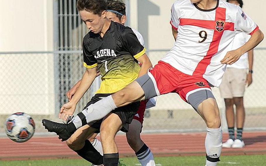 Nile C. Kinnick junior Kai Sullivan, right, had 35 goals and 10 assists this season, helping lead the Red Devils to an 18-3-1 record and their first Far East Division I Tournament title.