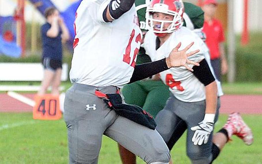 Senior Patrick Kelly tossed two touchdown passes to boost Nile C. Kinnick to its season-opening win last Friday at Kubasaki.