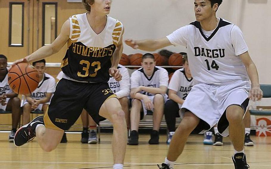 Connor Coyne, left, and Humphreys' boys basketball team will look to make it two straight titles in this weekend's American School In Japan Kanto Classic.