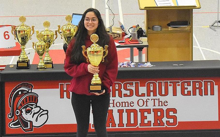 Kaiserslautern senior Isabelle Ploechinger poses with her individual championship trophy at the 2019-20 DODEA-Europe marksmanship championship meet Saturday at Kaiserslautern High School. Ploechinger split her storied high-school career between Stuttgart and Kaiserslautern. 