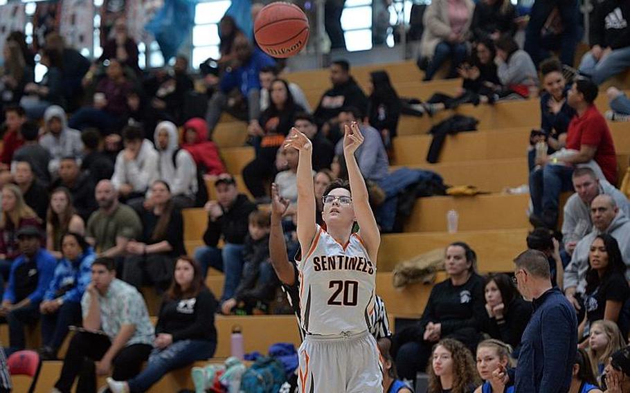 Lorelai Vargo hits a three-pointer in the girls Division III final at the DODEA-Europe basketball championships in Wiesbaden, Germany, Saturday, Feb. 22, 2020. Spangdahlem won 37-21.