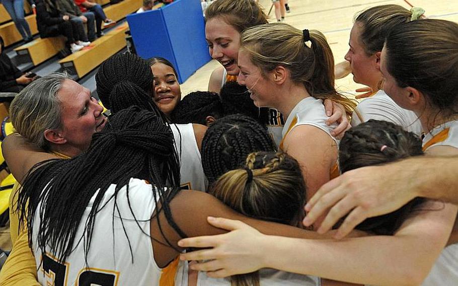 The Stuttgart Panthers celebrate their Division I title after defeating SHAPE 28-23 in the championship game at the DODEA-Europe basketball championships in Wiesbaden, Germany, Saturday, Feb. 22, 2020.