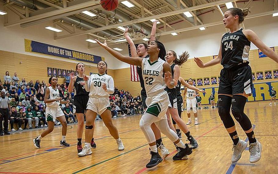Naples' Mia Rawlins takes a shot during the DODEA-Europe 2020 Division II Girls Basketball Championship game against Vicenza at the Wiesbaden High School, Germany, Saturday, Feb. 22, 2020. Naples won the game 44-35.