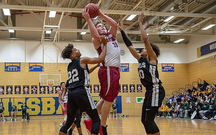 Aviano's Ben Broome goes up for a shot during the DODEA-Europe 2020 Division II Boys Basketball Championship game against Naples at Wiesbaden High School, Germany, Saturday, Feb. 22, 2020. Naples won the game 40-35.
