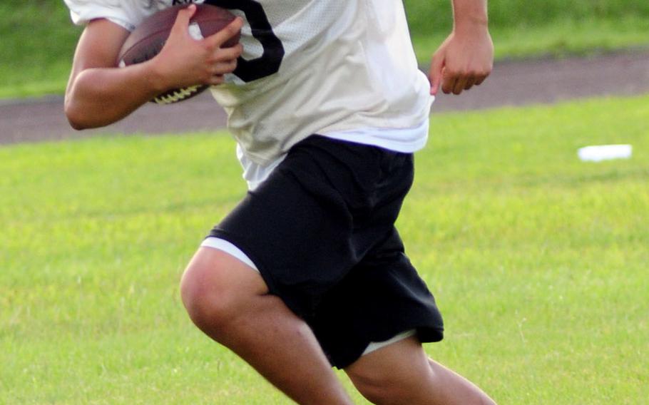 Kadena Panthers junior Joseph Hermon returns a kickoff during practice.