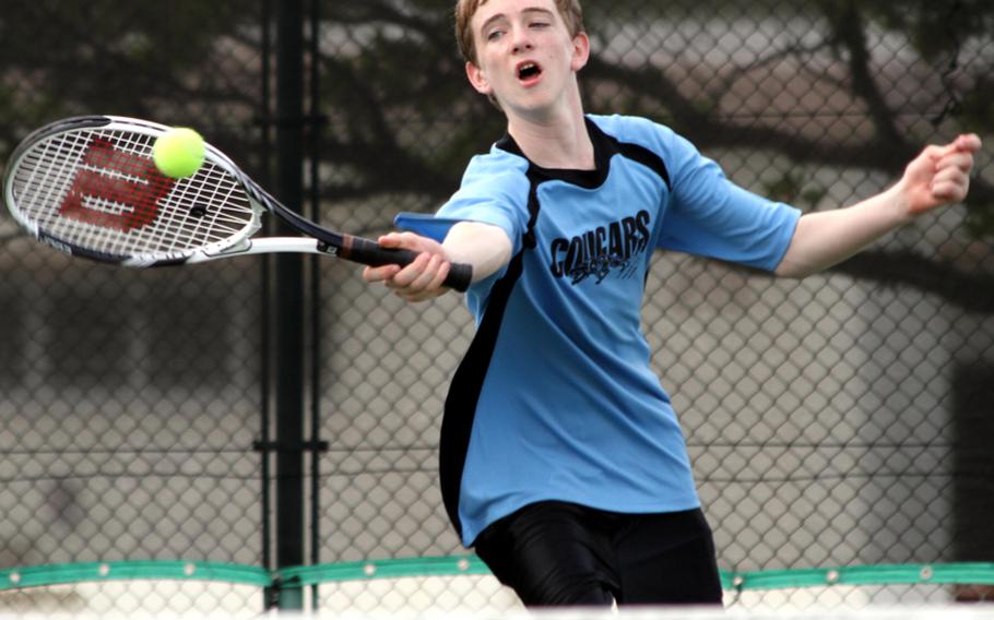 Keagan Hutchins of Osan American lunges for a drop shot during the first-round play in the 2011 Far East High School Tennis Tournament at Risner Tennis Complex, Kadena Air Base, Okinawa on Nov. 7, 2011. Hutcins and teammate Preston Blakely fell 8-1 to Matthew C. Perry's Sam and Jon Cadavos in the boys doubles, then lost a mixed doubles match 8-1 with teammate Angela Thompson to Zama American's Kenichi Mishler and Mina Fisher.