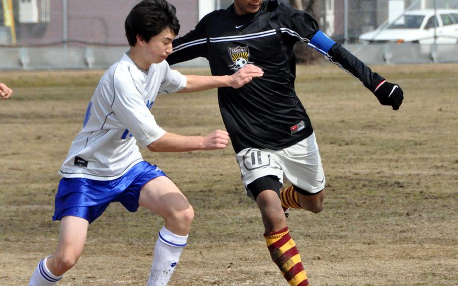 Matthew C. Perry Samurai's Yuta Fleming winds up to boot the ball against Kyoto International University Academy during the Perry Cup match at Matthew C. Perry High School on March 3, 2012,
at Marine Corps Air Station Iwakuni, Japan. The Samurai blanked KIUA 7-0 and won the tournament title.