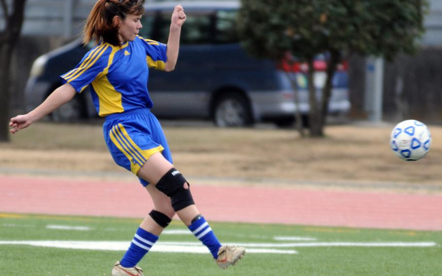 Yokota sweeper Emily Beemsterboer lets fly with a kick against Robert D. Edgren during Thursday's DODDS Japan girls soccer tournament at newly dedicated, field-turfed Bonk Field, Yokota Air Base. The Panthers blanked the Eagles 5-0.