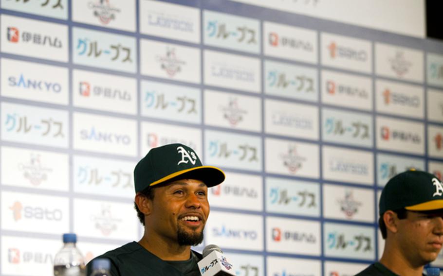 Oakland Athletics outfielder Coco Crisp speaks at a press conference Saturday at the Tokyo Dome Hotel in Tokyo.