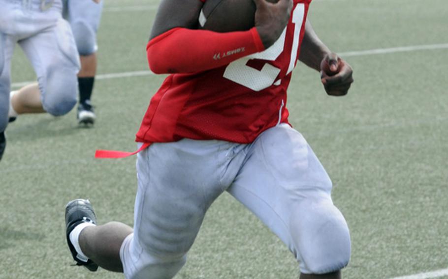 Nile C. Kinnick Red Devils senior running back Marcus Boatwright, a transfer from Florida, runs for the end zone during a scrimmage game Aug. 18, 2012, at Berkey Field, Yokosuka Naval Base, Japan.