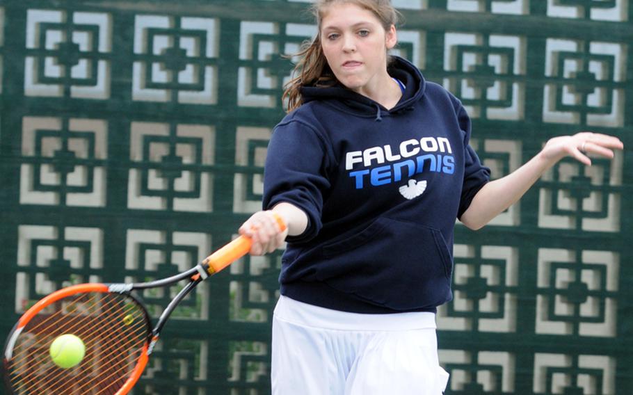 Carson Allen of Seoul American Falcons launches a forehand during Monday's first-round girls doubles match in the Far East High School Tennis Tournament at Risner Tennis Complex, Kadena Air Base, Okinawa. Allen and Ashley Cho lost to Nile C. Kinnick's Aiko Allan and Kyra Nguyen 8-5.