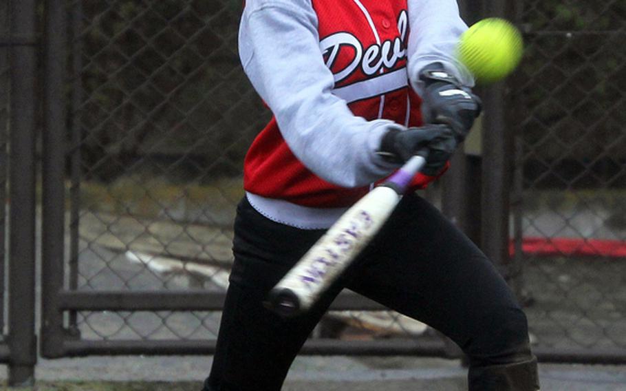 Nile C. Kinnick's Maria Montepio takes her cuts against Matthew C. Perry during Saturday's DODDS Japan softball tournament game at Yokota Air Base, Japan. Kinnick won 17-0 in two innings en route to its second straight tournament title.