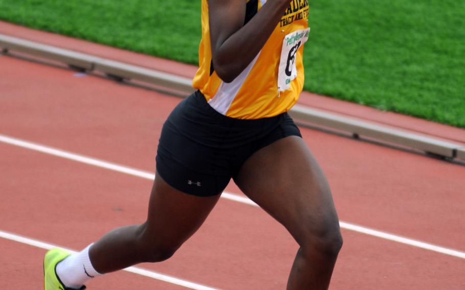 Kadena's Janika Caines races for the finish of the girls 200-meter dash during Saturday's second day of competition in the 10th Alva W. "Mike" Petty Memorial Track and Field Meet at Kadena Air Base, Okinawa. Caines won in a wind-aided 26.57 seconds.