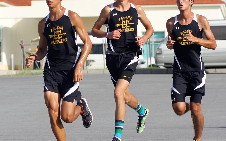Andrew Kilkenny, Hunter Ficenec and Yuji Callahan of Kadena set the pace in the boys 3.1-miler during Wednesday's Okinawa Activities Council cross-country meet at Yomitan, Okinawa. Kilkenny, the reigning Far East Division I and overall champion, won in 17 minutes, 44 seconds.