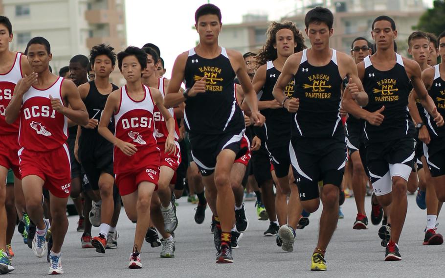 Kadena senior Andrew Kilkenny, middle, the reigning Far East champion, leads the pack at the start of Wednesday's Okinawa Activities Council cross-country meet at Camp Foster, Okinawa. Kilkenny won in 16 minutes, 8 seconds, best time for a DODDS Pacific runner this season and also a school and district record.