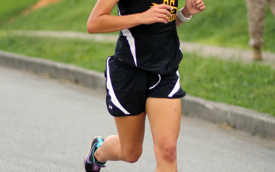 Kadena senior Ana Hernandez, the reigning Far East champion, heads for the finish of Wednesday's Okinawa Activities Council cross-country meet at Camp Foster, Okinawa. Hernandez won in 19 minutes, 7 seconds, best time for a Pacific runner this season and also a school and district record.