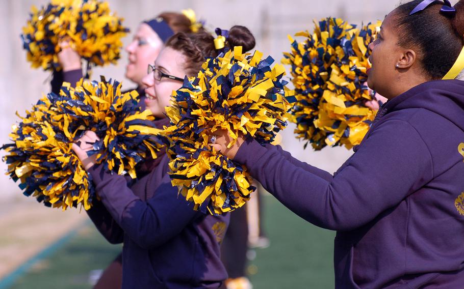 Navy cheerleaders shout it out for their players during Saturday's Korea Army-Navy flag football rivalry game at Yongsan Garrison, South Korea. The soldiers routed the sailors 62-0, improving to 14-3 in the Peninsula Trophy series.