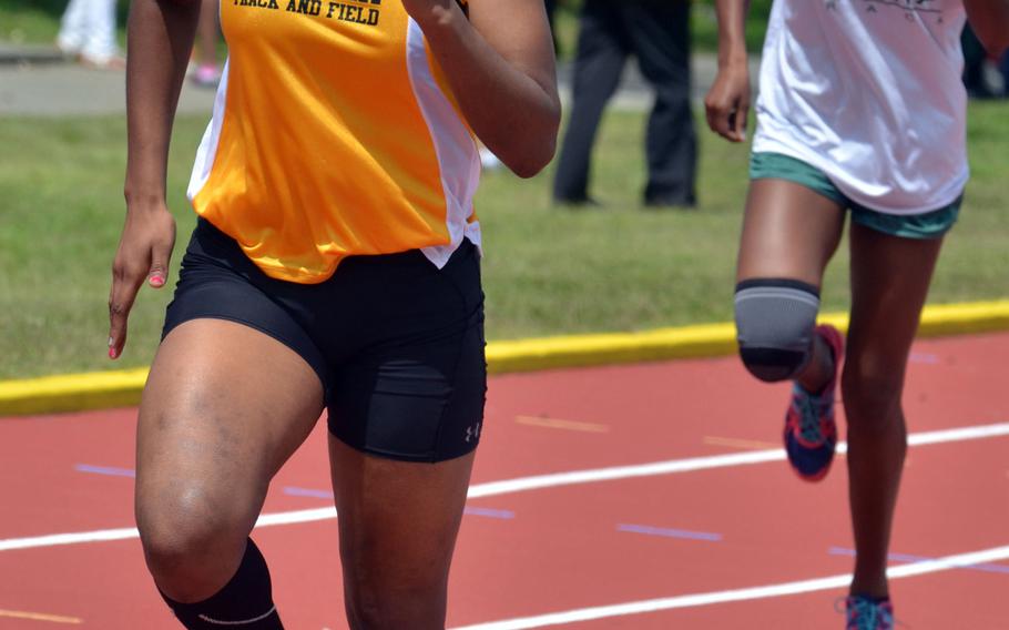 Kadena juniorJasmine Rhodes pounds for home in the 400-meter run during Saturday's season-opening high school track and field meet at Kadena Air Base, Okinawa. Rhodes won in 1 minute, 6.21 seconds.
