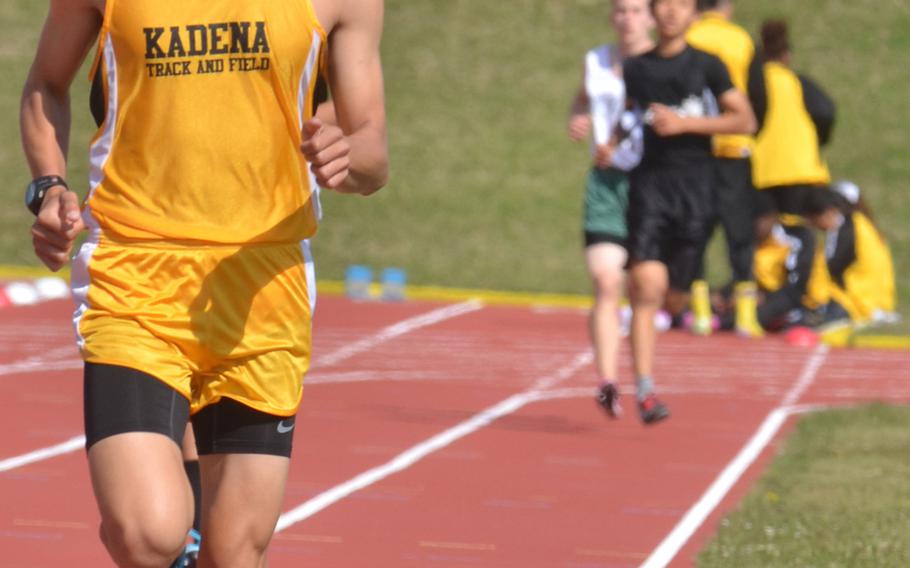 Kadena senior Andrew Kilkenny leads the pack in the 3,200 run during Saturday's season-opening high school track and field meet at Kadena Air Base, Okinawa. Kilkenny, the two-time Far East cross-country champion, won the 3,200 in 10 minutes, 16.59 seconds, and later took the 1,600 in 4:43.78.