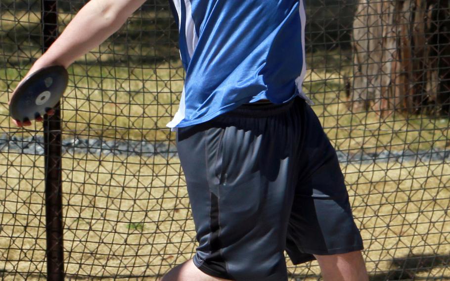 Yokota's Christian Sonnenberg readies a discus throw during Saturday's DODDS Japan track and field meet at Yokota Air Base, Japan. Sonnenberg won with a throw of 119 feet, 9 inches.