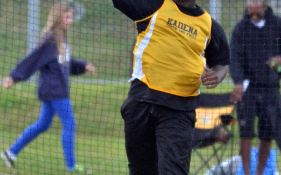 Kadena's Nolynn Riley lets the discus fly during Thursday's first day of the 2nd Oki Relays at Camp Foster, Okinawa. Riley won with a throw of 107 feet, 6 inches.