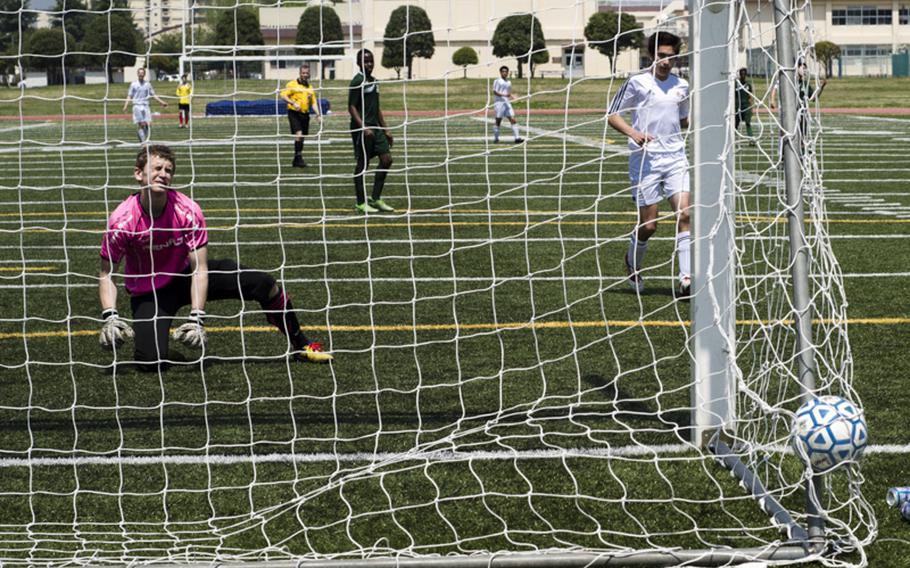 Goalkeeper Austin Burdick of Robert D. Edgren reacts to a goal during pool play of the DODDS Japan Boys Soccer Tournament in Yokota, Japan on Friday. Edgren would end up losing to Nile C. Kinnick 2-0.