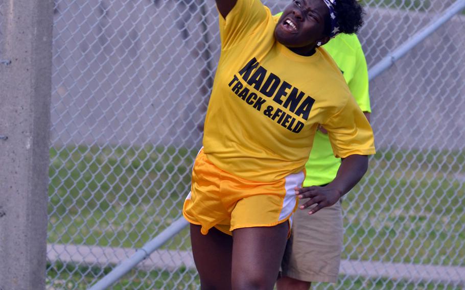 Kadena thrower Jazmyn Sharper puts the shot during Friday's first day of the Okinawa track and field finals at Camp Foster, Okinawa. Sharper won the shot put with a throw of 31 feet, 5 inches, and also the discus in 97-3, taking both events by wide margins.