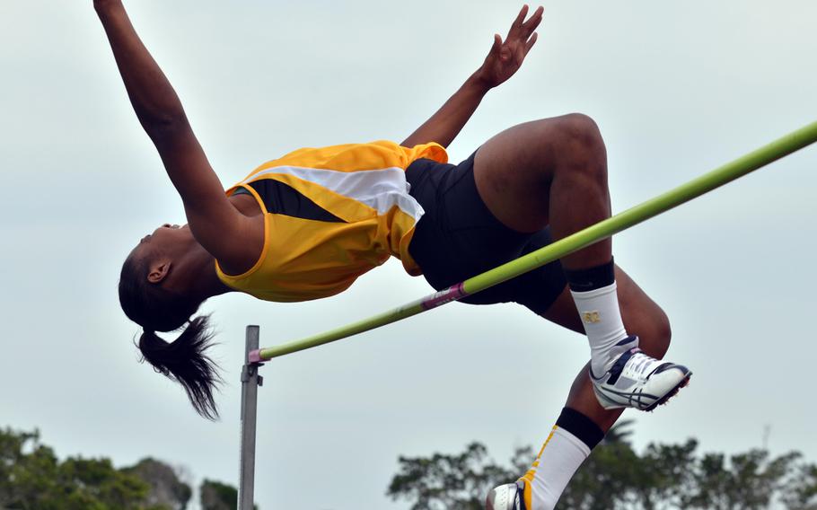 Kadena high jumper Jasmine Rhodes clears the bar during Friday's first day of the Okinawa track and field finals at Camp Foster, Okinawa. Rhodes won with a jump of 4 feet, 11 inches.