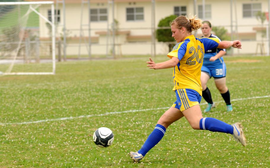 Sarah Claypool of Yokota High School takes a shot at the Far East Soccer Tournament being held at Camp Foster, Okinawa, May 19, 2014. 