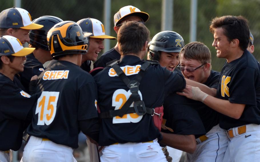 Time to bounce in Atsugi! Kadena's Panthers celebrate their walk-off quarterfinal 8-5 win over St. Mary's International in Friday's Far East Division I Baseball Tournament quarterfinal. They reached their third D-I title game in five years.