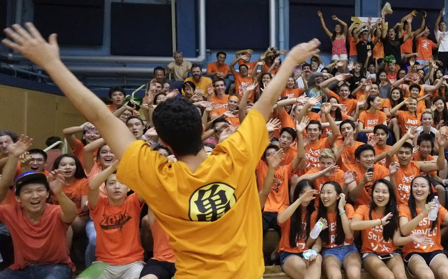 The American School In Japan student section feted Orange Out for leukemia awareness during an Oct. 3 volleyball game in Chofu, Japan between DODDS Pacific powerhouses American School in Japan and Nile C. Kinnick. ASIJ would win in straight sets 25-17, 25-19, 27-25.