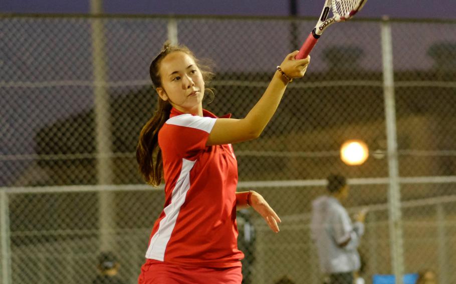 Nile C. Kinnick's Monica Burford returns a serve during her first match in the consolation bracket of the DODDS Japan Tennis Tournament in Zama, Japan Oct. 24. Burford defeated Matthew C. Perry's Monica Grant 8-4.