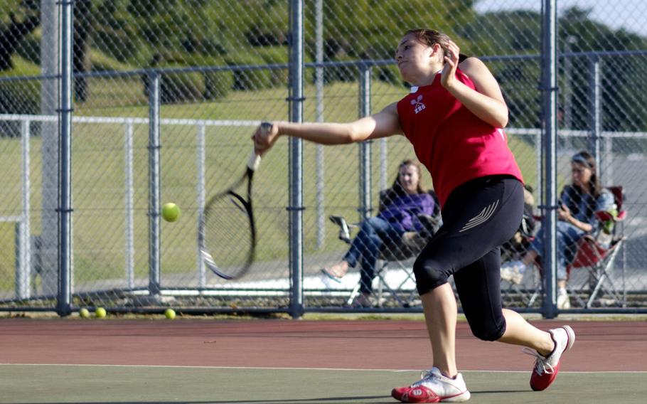 Nile C. Kinnick's Raena Schoeff prepares to return a volley Saturday during the DODDS Japan Tournament girls singles championship at Camp Zama, Japan. Schoeff won the title 8-5.