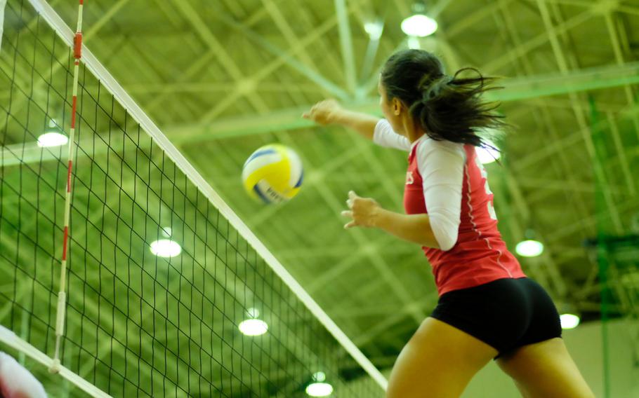 Kinnick's Shakita Samuels warms up before the Red Devils round robin match against Kubasaki in the Far East Tournament at Yokota Air Base, Japan Nov. 3. Kinnick lost the game 25-21, 25-20.