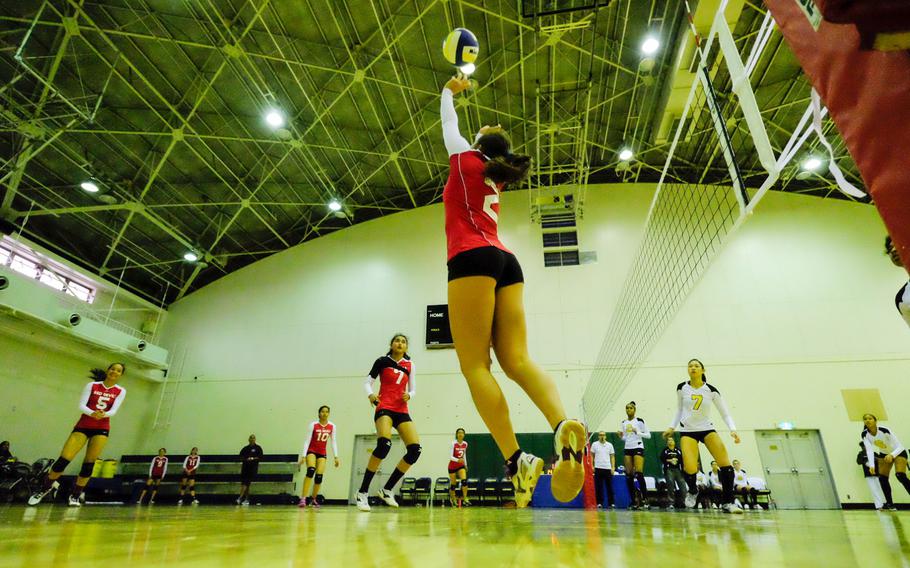 Kinnick's Charla Johnson sets up one of her teammates during the first day of the Far East Tournament round robin at Yokota Air Base, Japan Nov. 3. Kinnick heads into Tuesday with an even 2-2 record.