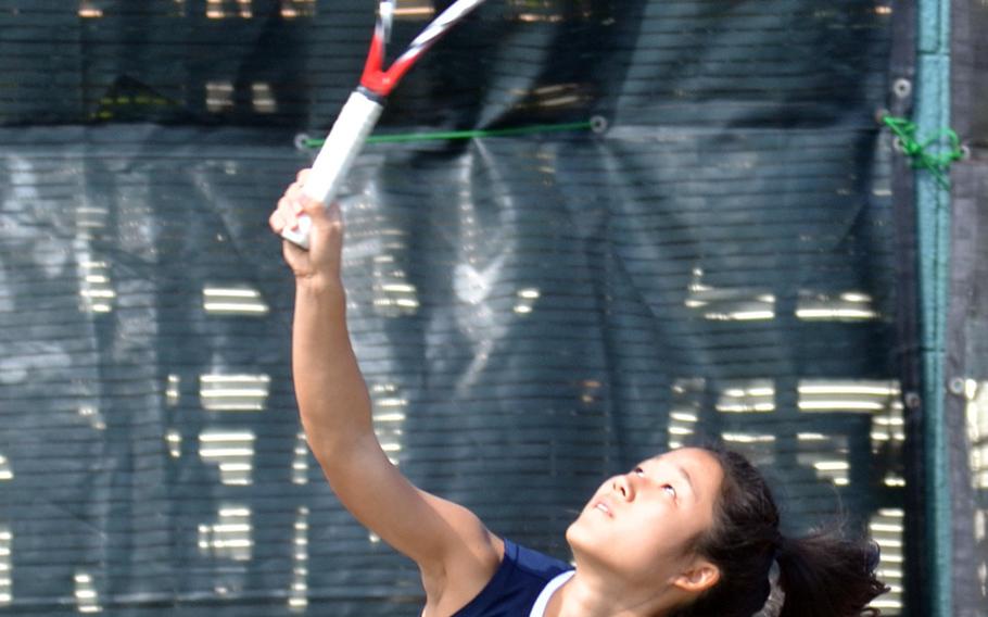 Seoul American's Grace Cho serves against American School In Japan's Erin Blank during her 8-1 quarterfinal win Tuesday in the Far East High School Tennis Tournament.