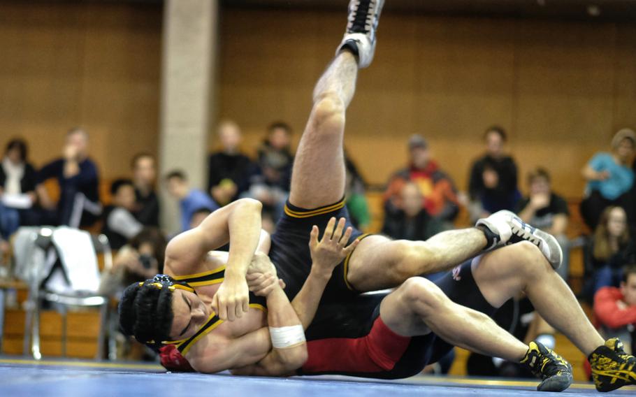 Americamn School in Japan's David Rochman found himself caught in a lock that he couldn't overcome in his 148-pound championshio match against Nile C. Kinnick's Brady Yoder during the Kanto Wrestling Invitational at Christian Academy in Japan in Higashikurume, Japan.