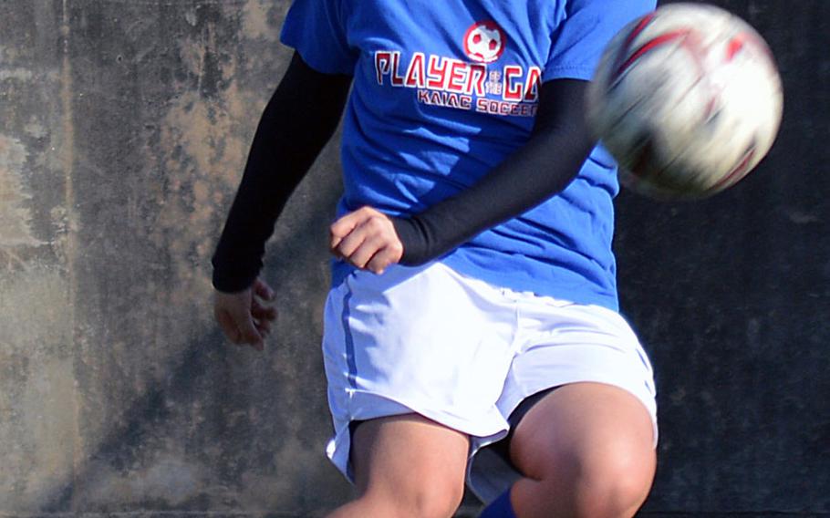 Seoul American defender Kayla Granado works on corner kicks during Wednesday's practice.