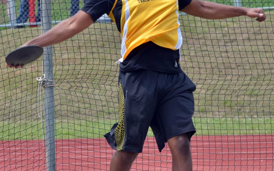 Kadena's Michael Clayton lets the discus fly, an event he won with a throw of 113 feet, 6 inches in Saturday's Okinawa season-opening track and field meet.